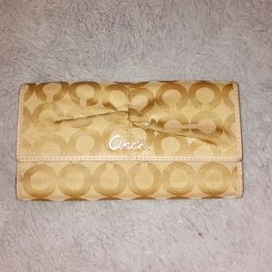 Coach wallet. Large gold plenty of credit card room